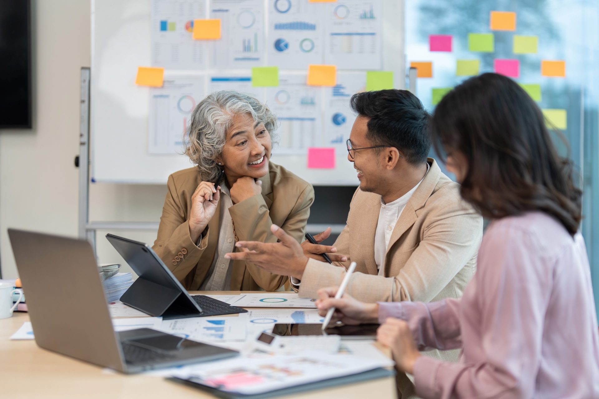 Group of Business people discuss a strategy to improve business.